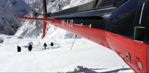 Adventure Fly For ABC During Snowfall By Helicopter